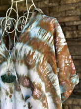 Load image into Gallery viewer, Women’s Large (could also fit XL) 100% Rayon Surplice High Low Front Twist Blouse Top in ‘Wild Thing’
